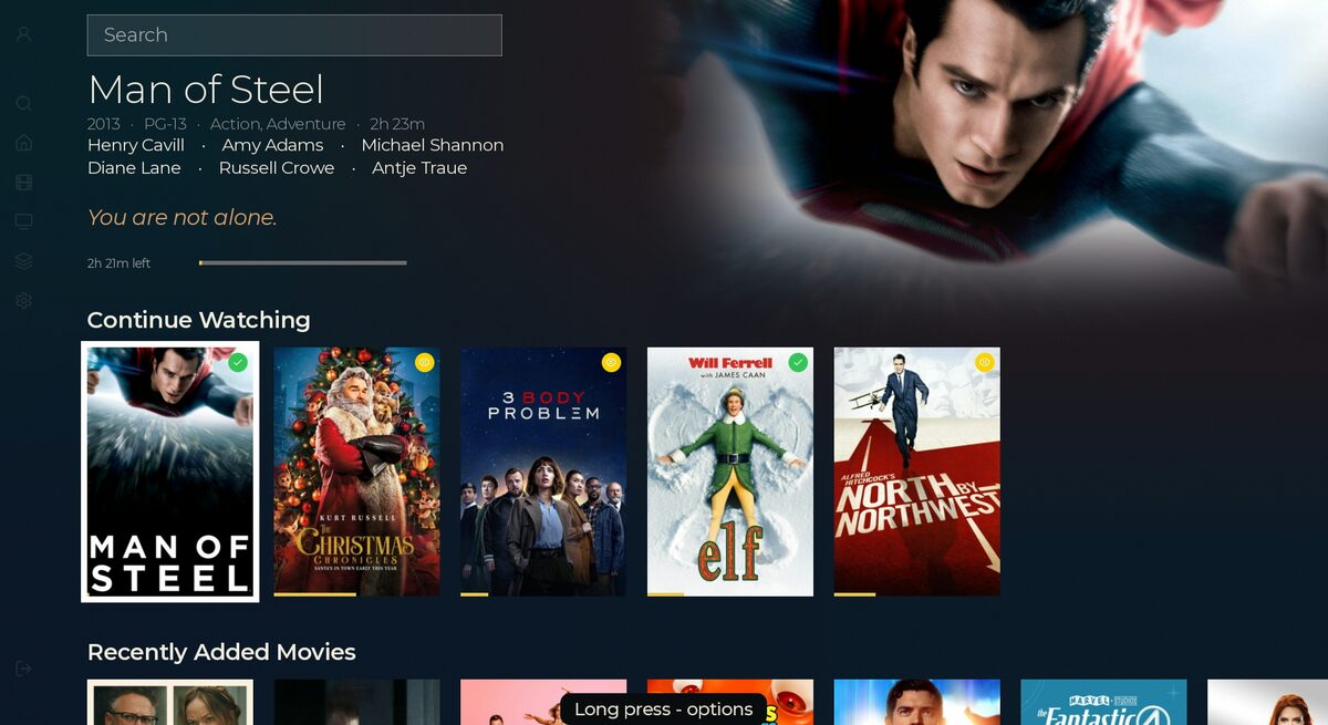 Reel's Home screen: the left rail collapsed to a slim icon gutter, a focused film re-tinting the whole page its own colors, a Continue Watching row below.